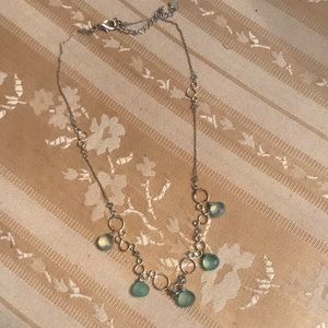 Necklace with 5 pale blue stones